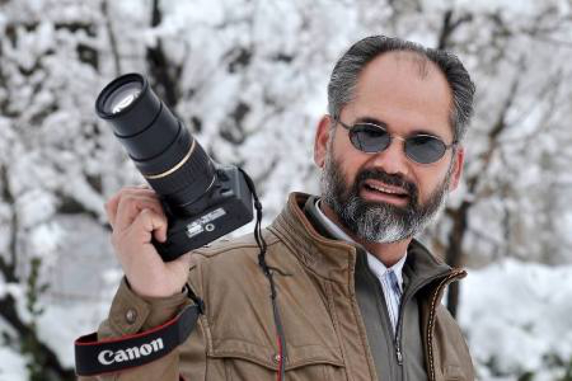 Photo journalist released on presidential decree